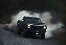 black pick up truck driving on off road